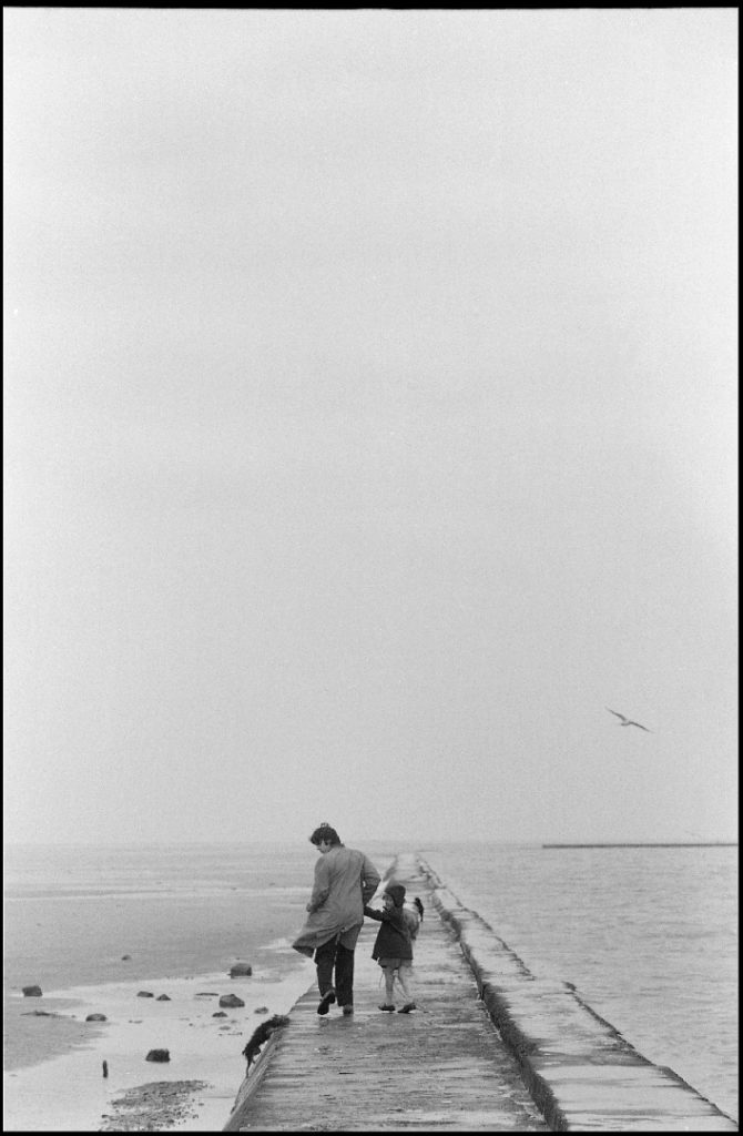 Photo of Paul and Heather McCartney on the pier, Wirral.Taken in 1968 by Linda McCartney