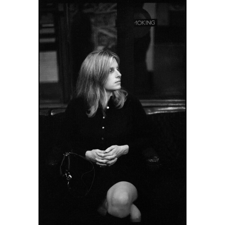 Black and white photograph of Linda McCartney on the Bakerloo line in 1969.